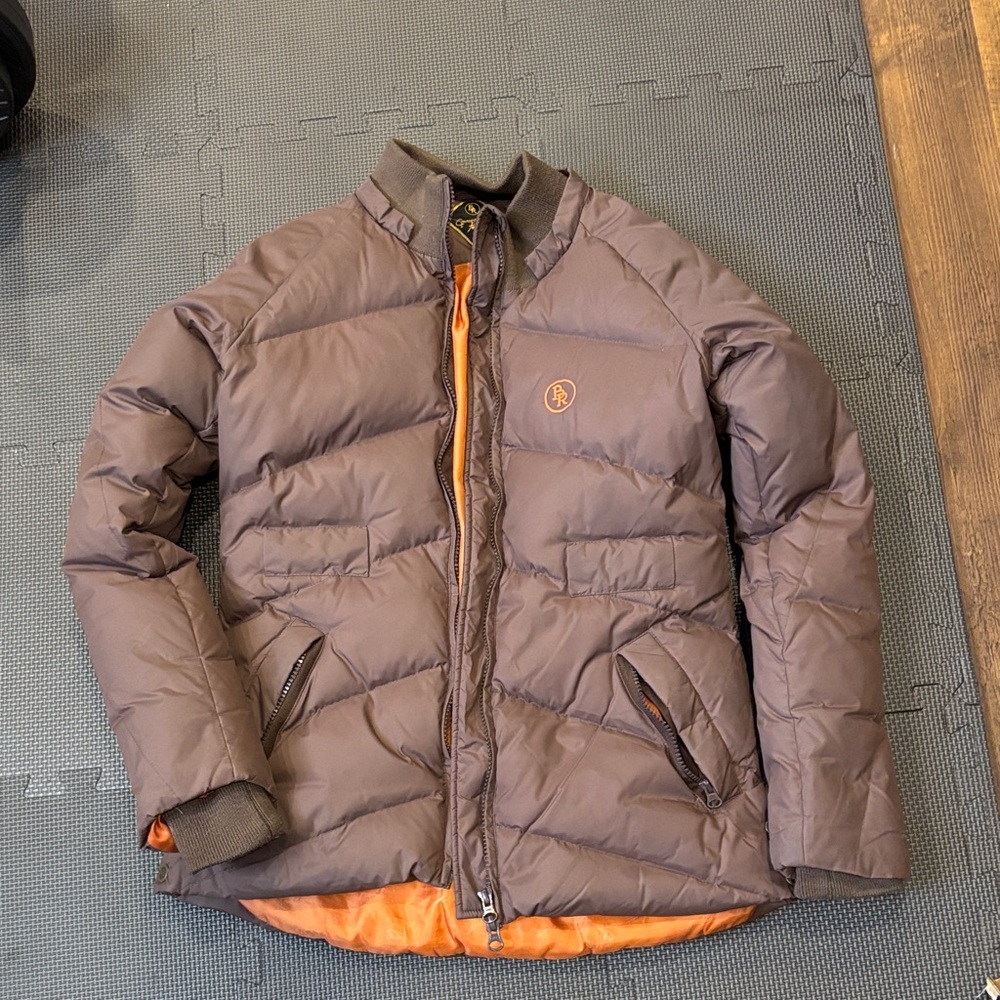 Stylish Brown Puffer Jacket with Orange Accents
